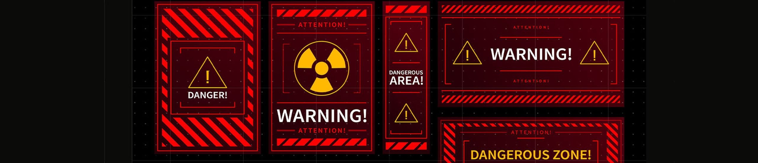 Unterschiedliche Alarmschilder auf schwarzem Hintergrund mit warnenden Schriftzügen und grafischen Warnhinweisen