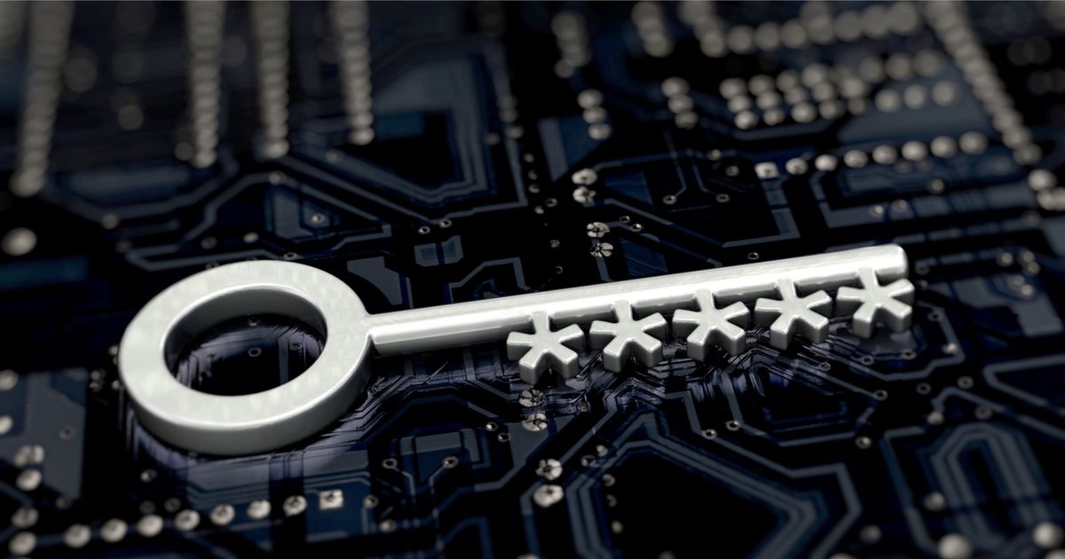 Ein Schlüssel mit fünf Sternchen anstelle eines Schlüsselbartes liegt auf einer Elektronikplatine.