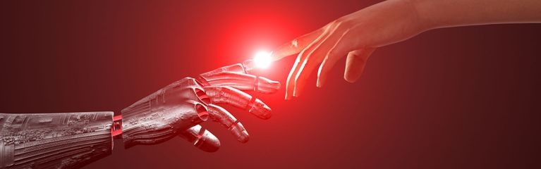 Eine humanoide Roboterhand und eine menschliche Hand berühren sich mit den Zeigefingern.