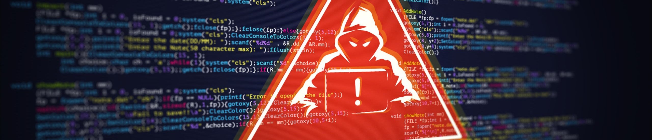 Ein rotes Warndreieck mit Hacker:in in der Mitte und der Unterschrift „System Hacked“