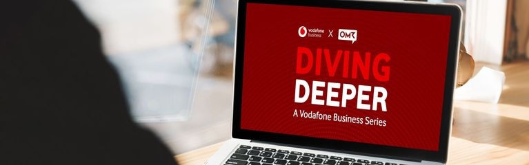 Diving Deeper-Logo auf einem Laptop