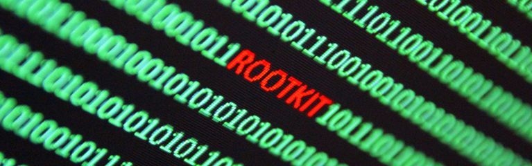 Binärcode auf Gründisplay mit rotem Schriftzug ROOTKIT