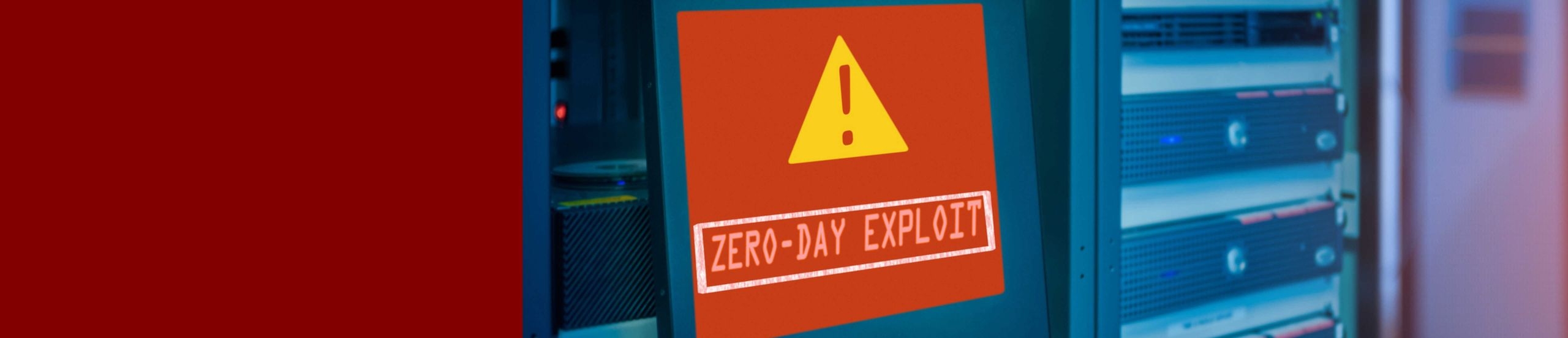 In einem Serverraum steht ein Notebook, auf dessen Bildschirm eine Warnung vor einem Zero-Day-Exploit rot leuchtet.