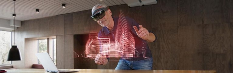 Mann mit AR-Brille und Animation im Büro